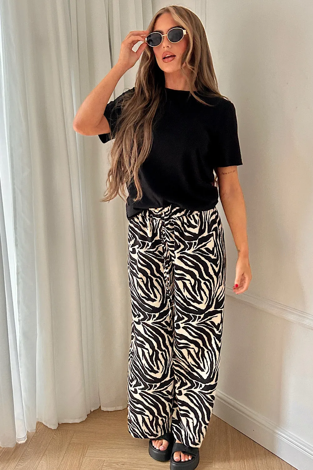 Shannon Black Zebra Print Flared Trousers