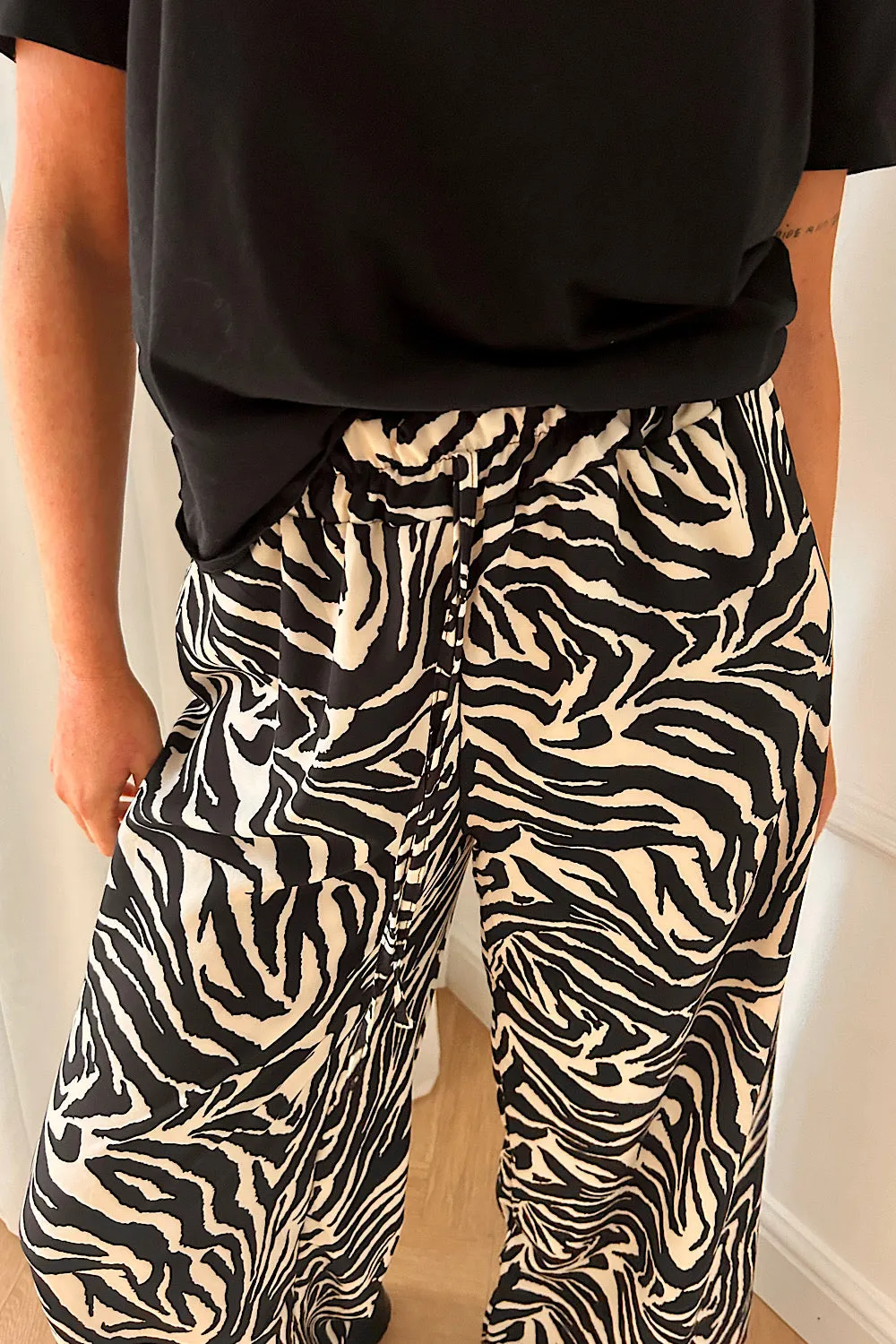 Shannon Black Zebra Print Flared Trousers