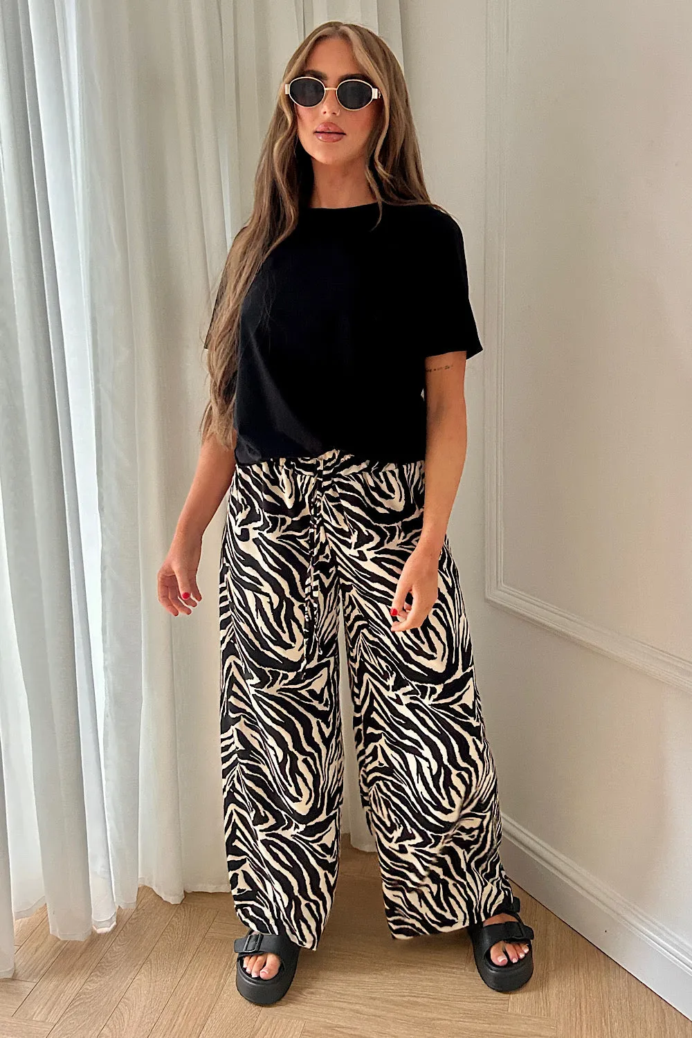 Shannon Black Zebra Print Flared Trousers